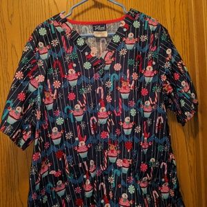 Set of three Christmas print scrub tops